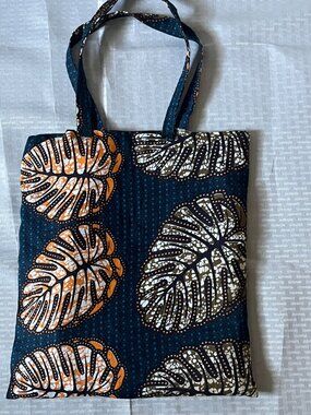 Stylish Blue Tote Bag with beautiful lorange leaf pattern really solid.